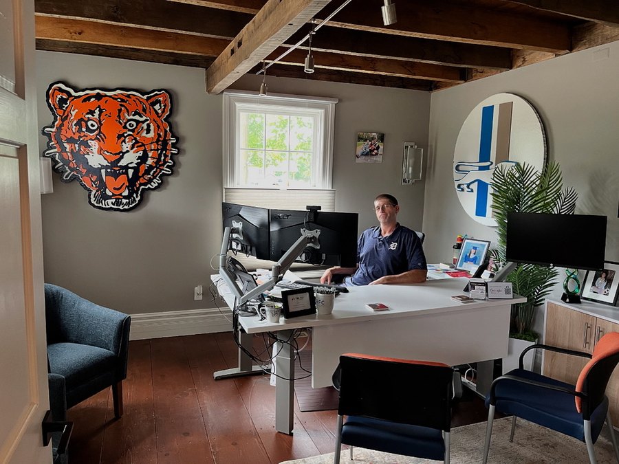 Custom Detroit Tigers tiger head and retro Lions circle cutouts in an office