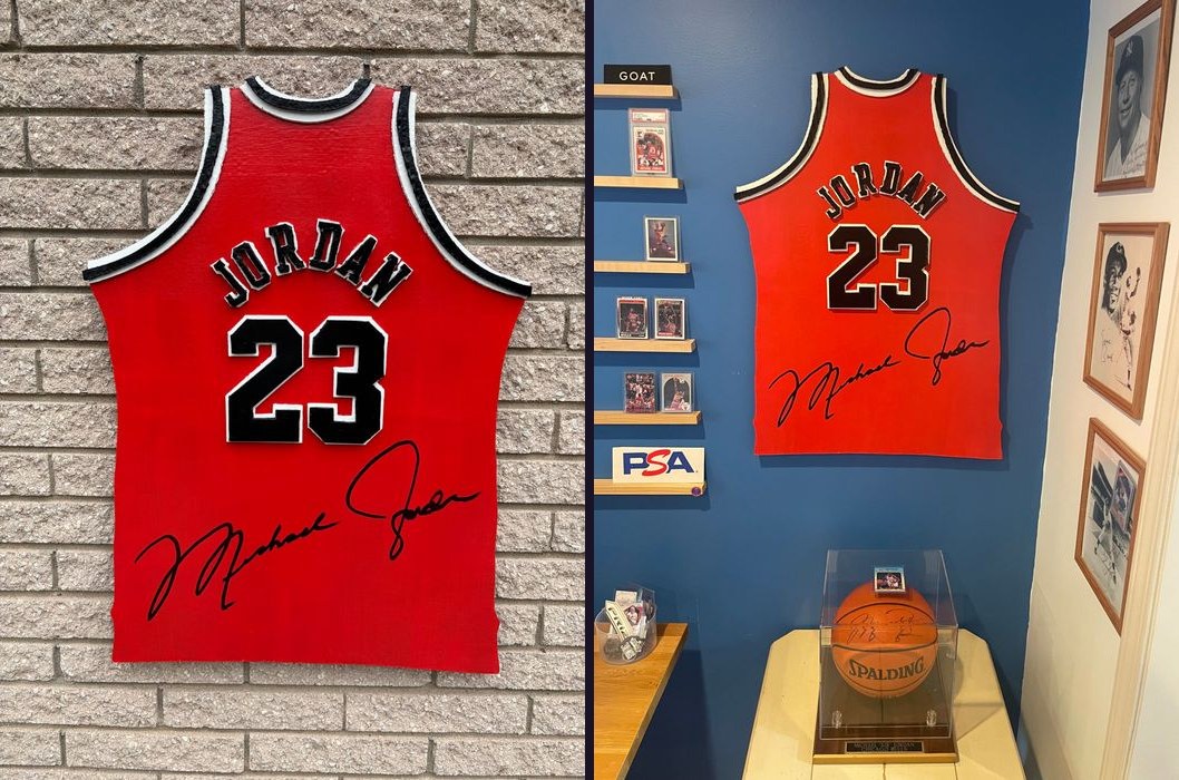 Custom Michael Jordan number 23 tribute jersey cutout, on brick wall and displayed with memorabilia