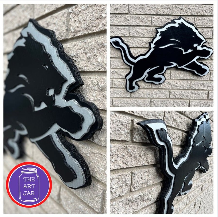 Custom black and silver Detroit Lions logo cutout, three angles
