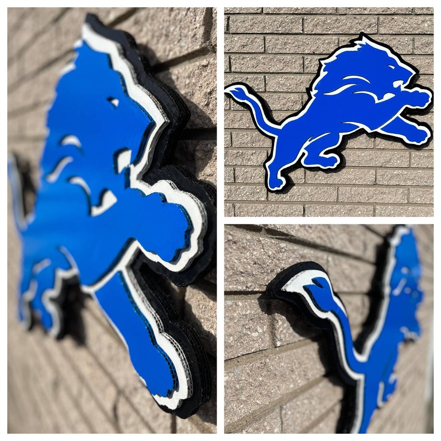 Custom Detroit Lions logo cutout, three angles on brick wall