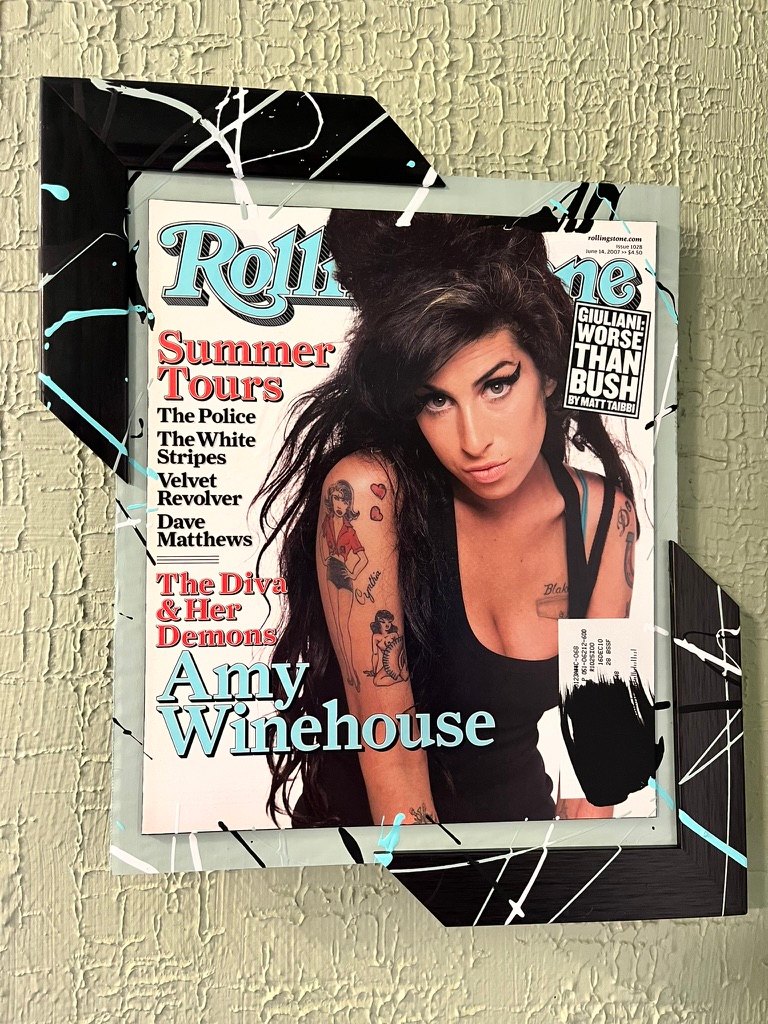 Hand-embellished Rolling Stone Amy Winehouse The Diva and Her Demons cover in a black splatter-painted frame with aqua accents