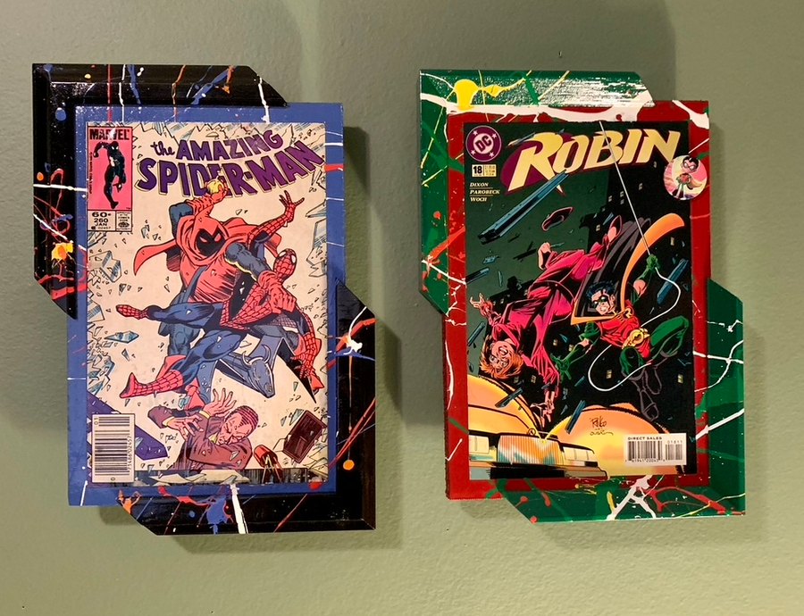 Hand-embellished Amazing Spider-Man and Robin comic covers in custom splatter-painted frames
