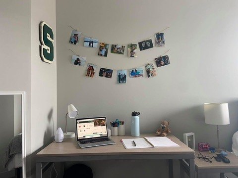 Custom Michigan State block S cutout on a dorm room wall above a desk