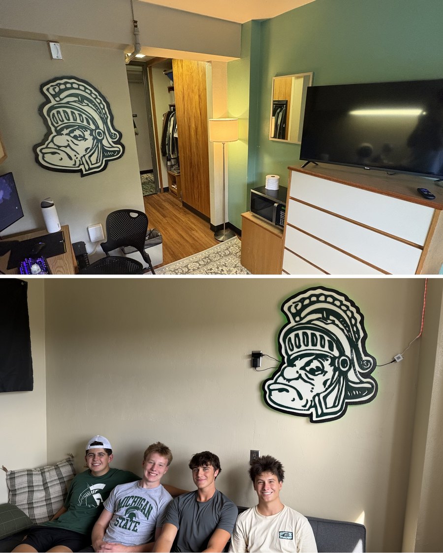 Custom Michigan State Sparty cutout in a dorm room, with roommates
