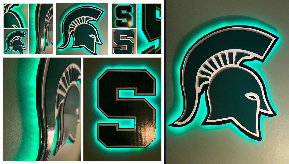 Custom Michigan State Spartan helmet and block S cutouts with teal LED backlighting, collage of angles next to the glowing helmet