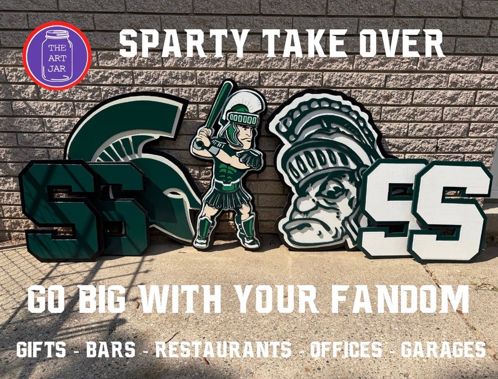 Sparty Take Over: custom Michigan State Spartan helmet, Sparty with baseball bat, Sparty head and block SS cutouts on a brick wall, Go Big With Your Fandom