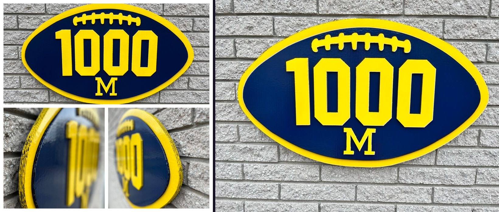 Custom Michigan 1000 football cutout in navy and maize on brick, collage of close-up angles and the full front view