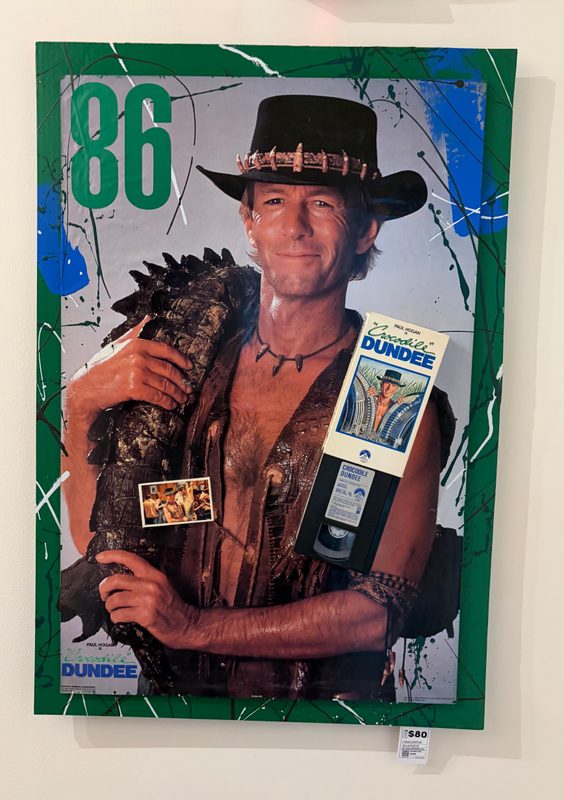 Funko-style Crocodile Dundee 1986 movie poster art with splatter paint