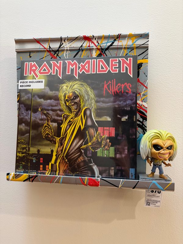Iron Maiden Killers album art on a shelf with an Iron Maiden Funko Pop