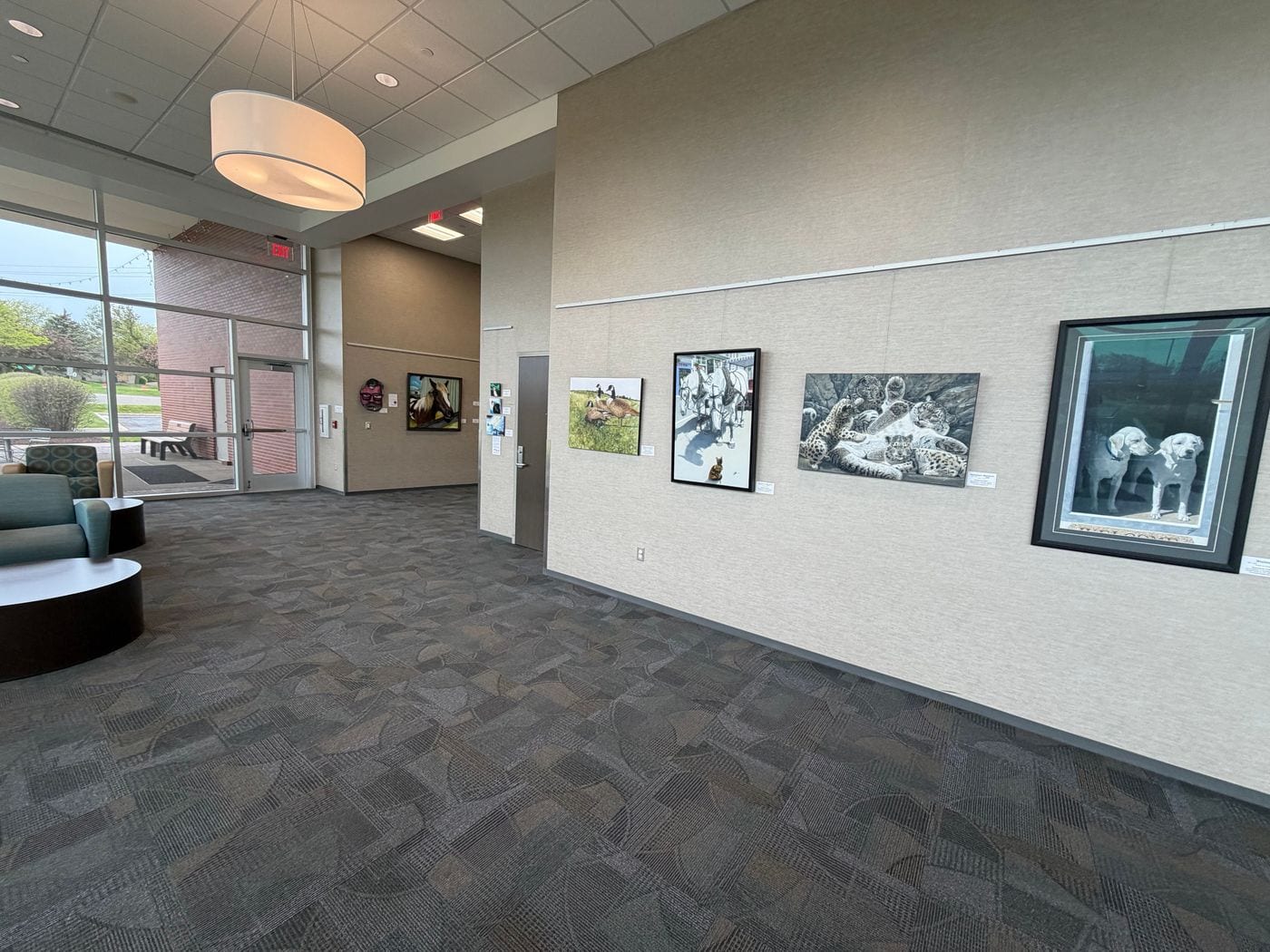 The gallery at Westland City Hall with artwork along the walls