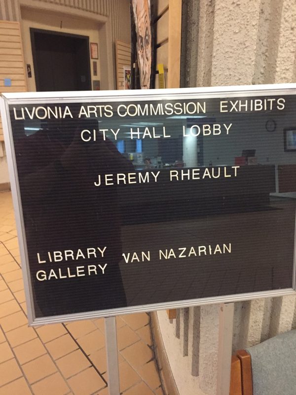 Exhibit sign: Livonia Arts Commission Exhibits, City Hall Lobby, Jeremy Rheault