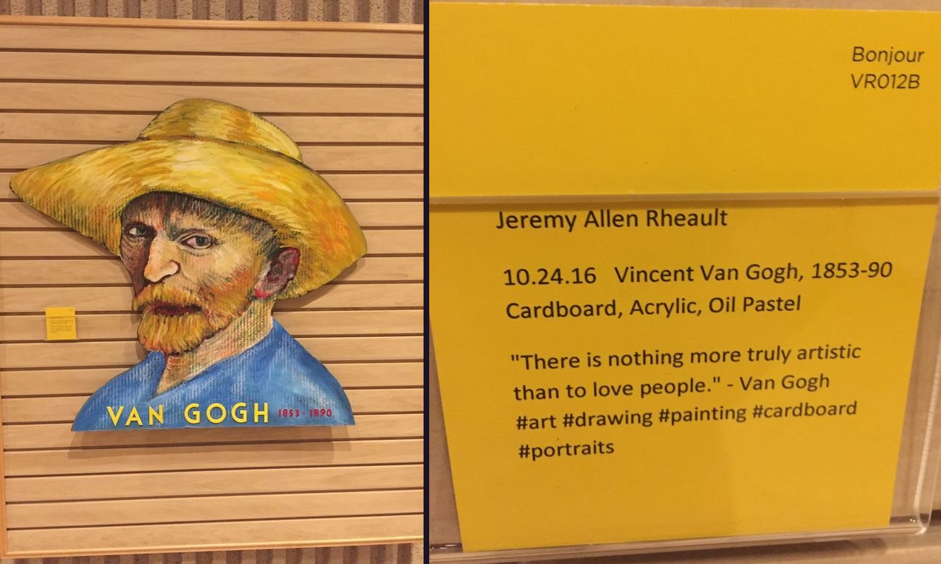 Painted cardboard portrait of Van Gogh in a straw hat next to its yellow gallery card