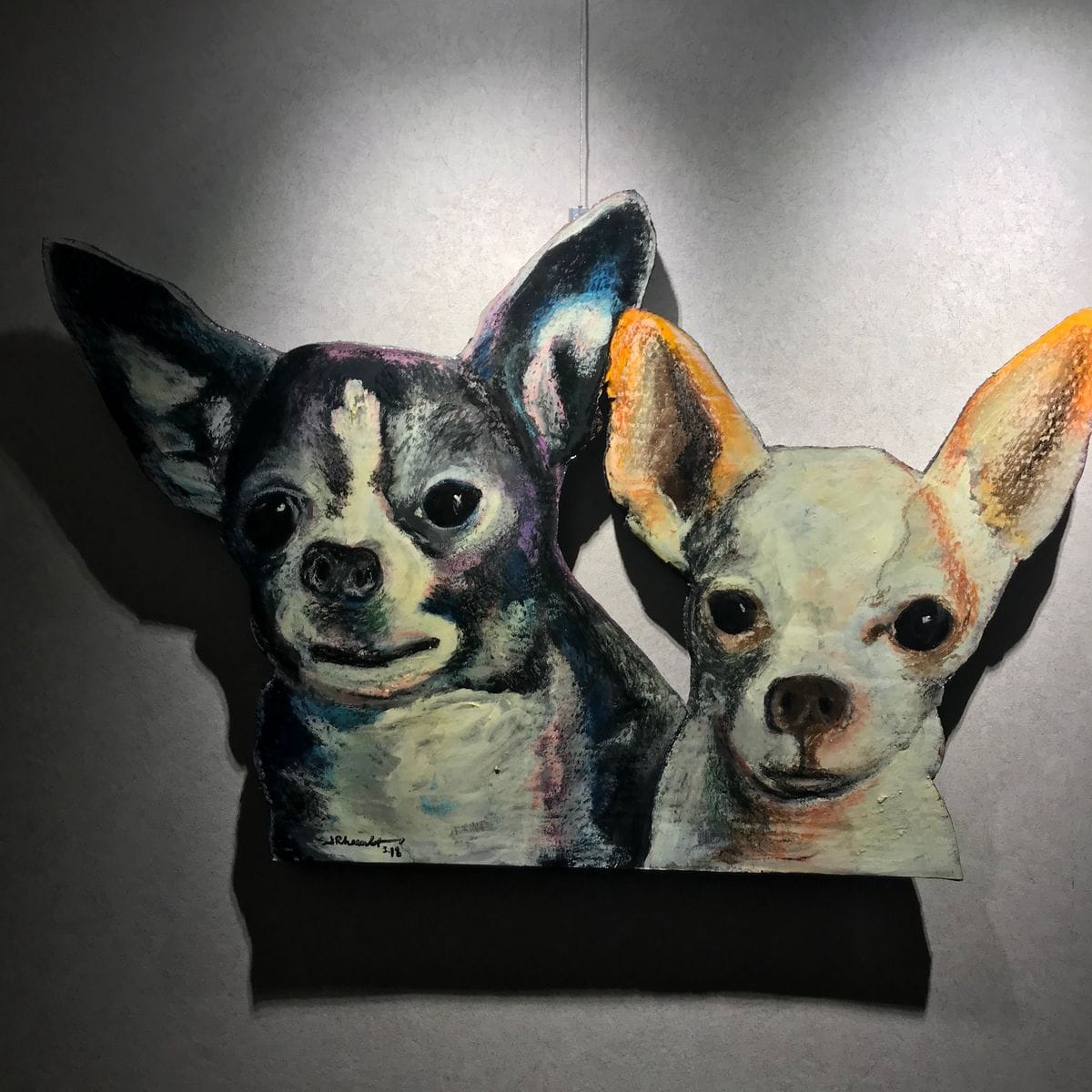 Naomi’s Chihuahuas by Jeremy Rheault on the wall at The Village Theater