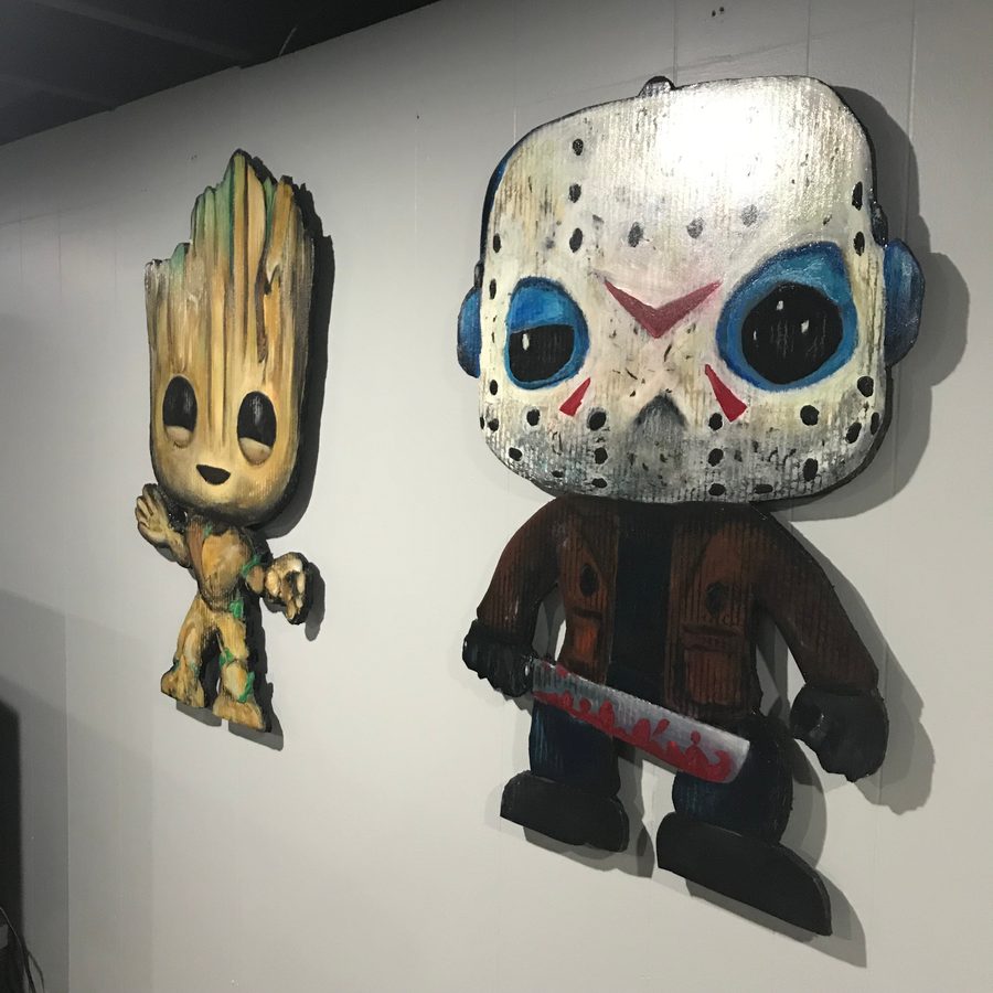 Groot and Jason Voorhees hand-cut cutouts hung side by side on a white wall