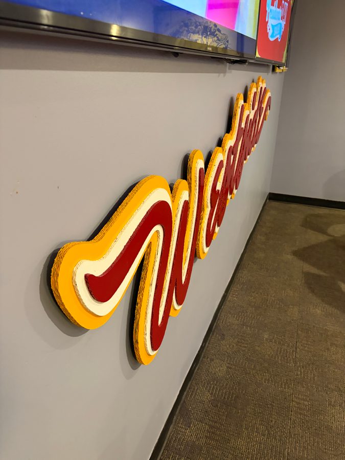 The Westside script sign seen from the side, showing the layered edges