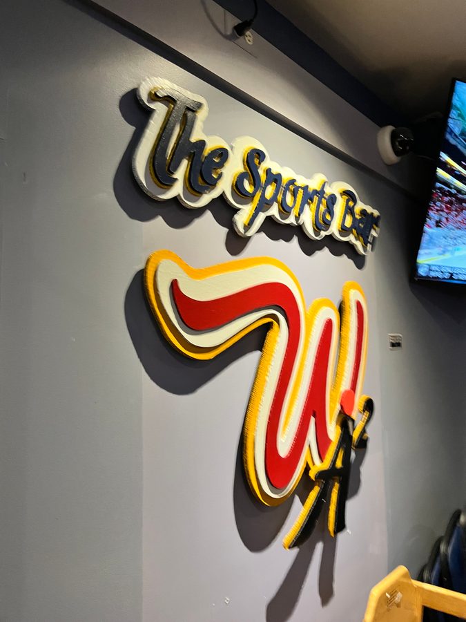 The W logo with the Sports Bar lettering above it